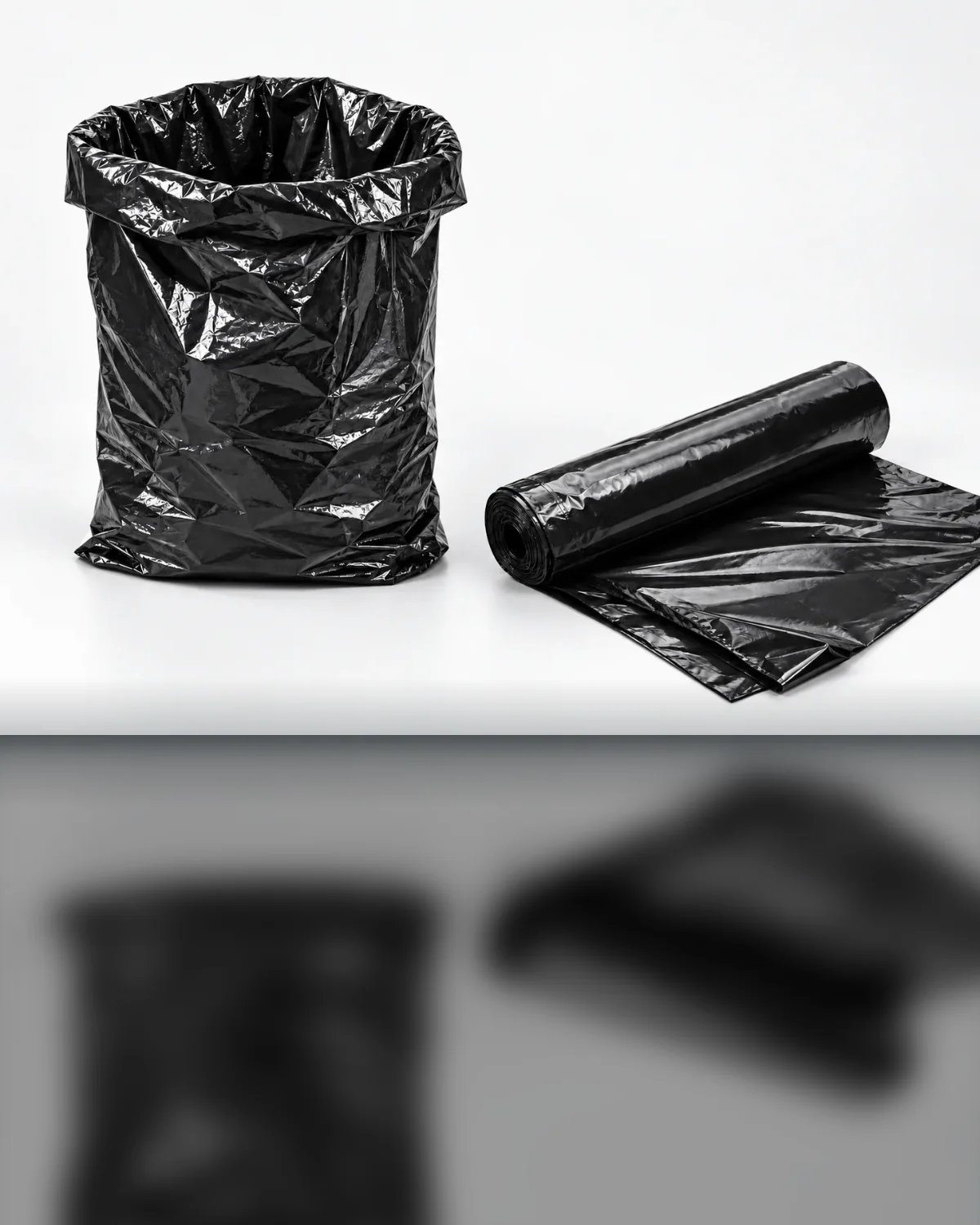 Black trash bag and roll of black plastic